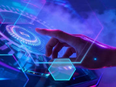 An individual engaging with a high-tech interface on a screen, highlighting innovative digital interaction.