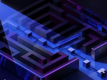 A maze game under a focused light, showcasing its complex layout and structure.