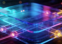 A computer with a glowing light on its surface, indicating it is powered on and in use.